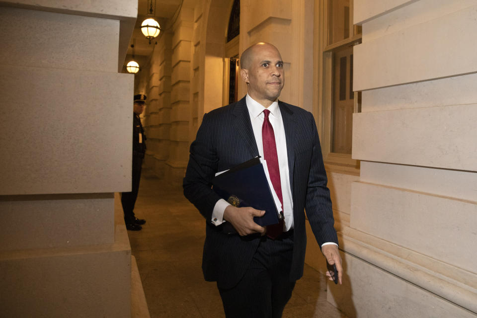 Sen. Cory Booker, D-N.J., leaves Capitol Hill in Washington, Friday, Jan. 31, 2020, after the Senate voted to not allow witnesses in the impeachment trial of President Donald Trump on charges of abuse of power and obstruction of Congress. (AP Photo/Jacquelyn Martin)
