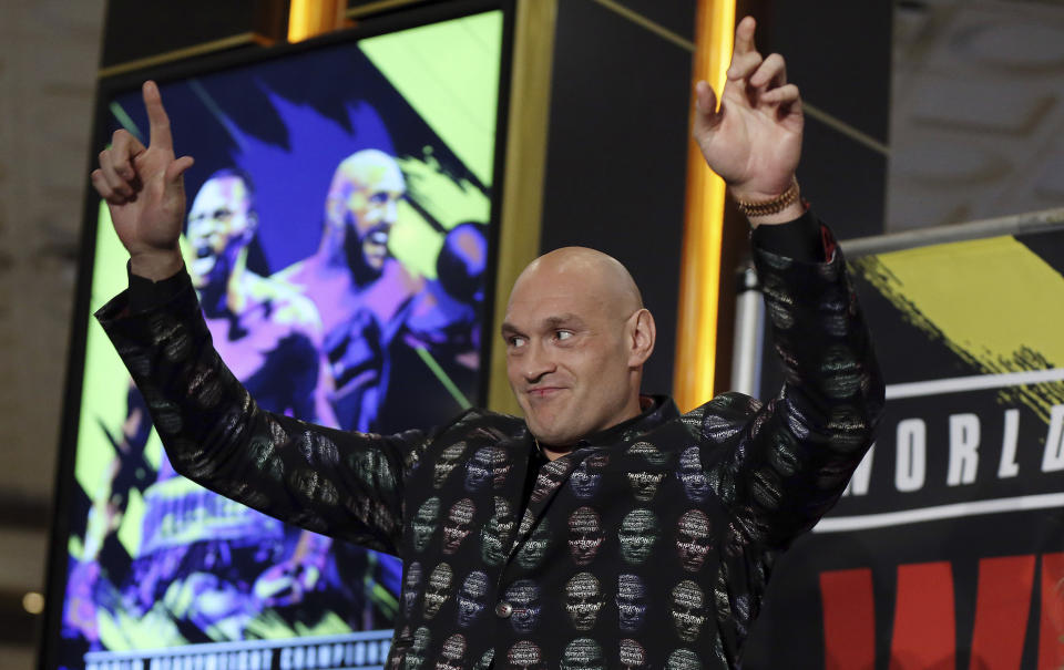 Tyson Fury, of England, who is scheduled to fight Deontay Wilder on Saturday for the WBC heavyweight boxing title, arrives at the MGM Grand on Tuesday, Feb. 18, 2020, in Las Vegas. (AP Photo/Isaac Brekken)