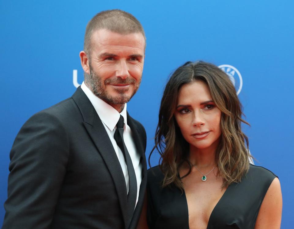 David Beckham and his wife Victoria arrive to attend the draw for UEFA Champions League football tournament at The Grimaldi Forum in Monaco on August 30, 2018