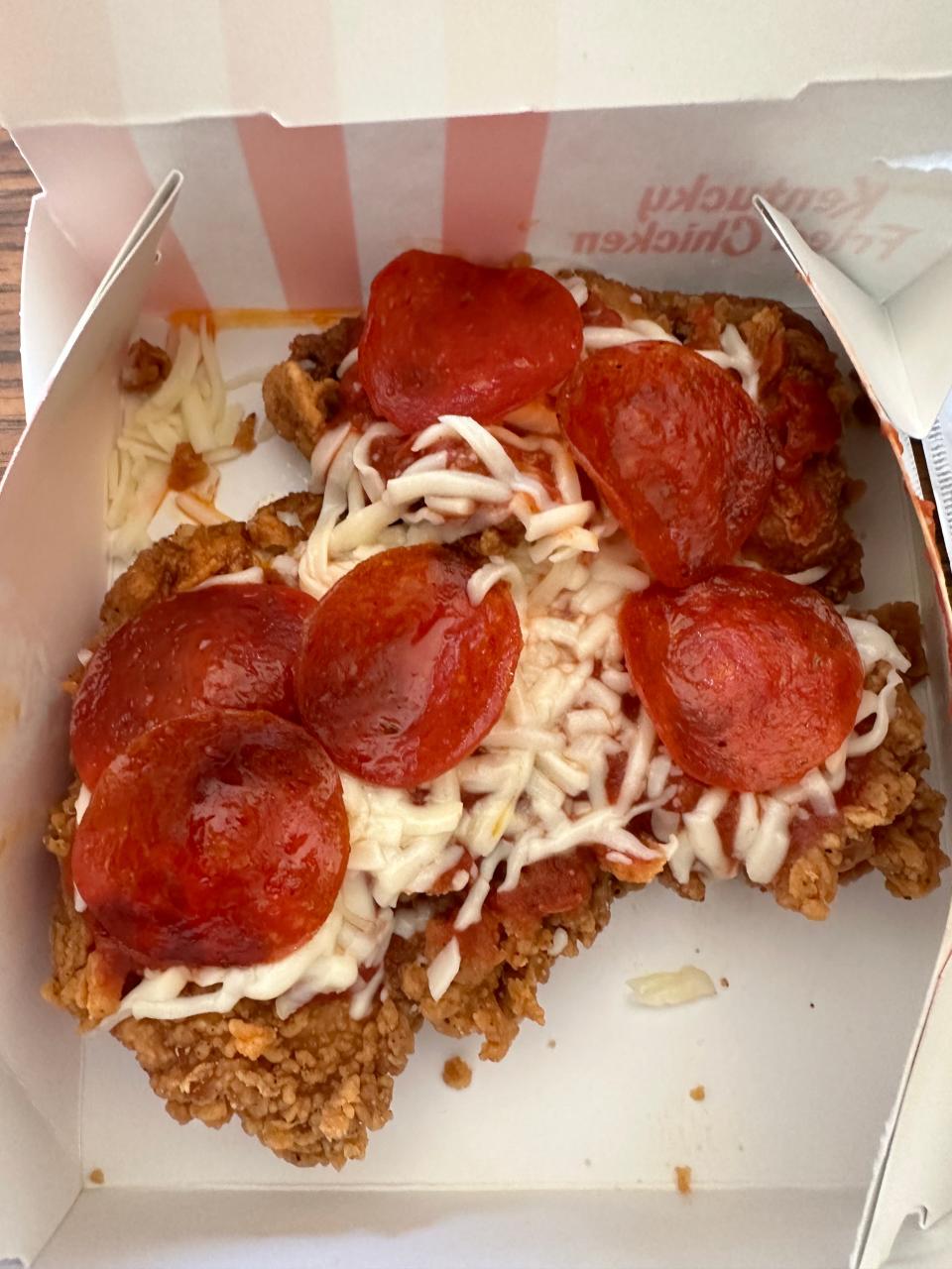Kentucky Fried Chicken launched Chizza on Monday. The new menu item tries to combine pizza and fried chicken.