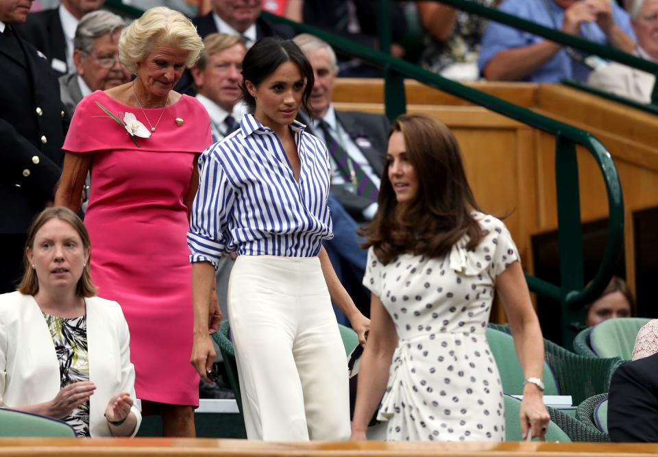 <p>Making their way to their seats in the royal box.</p>
