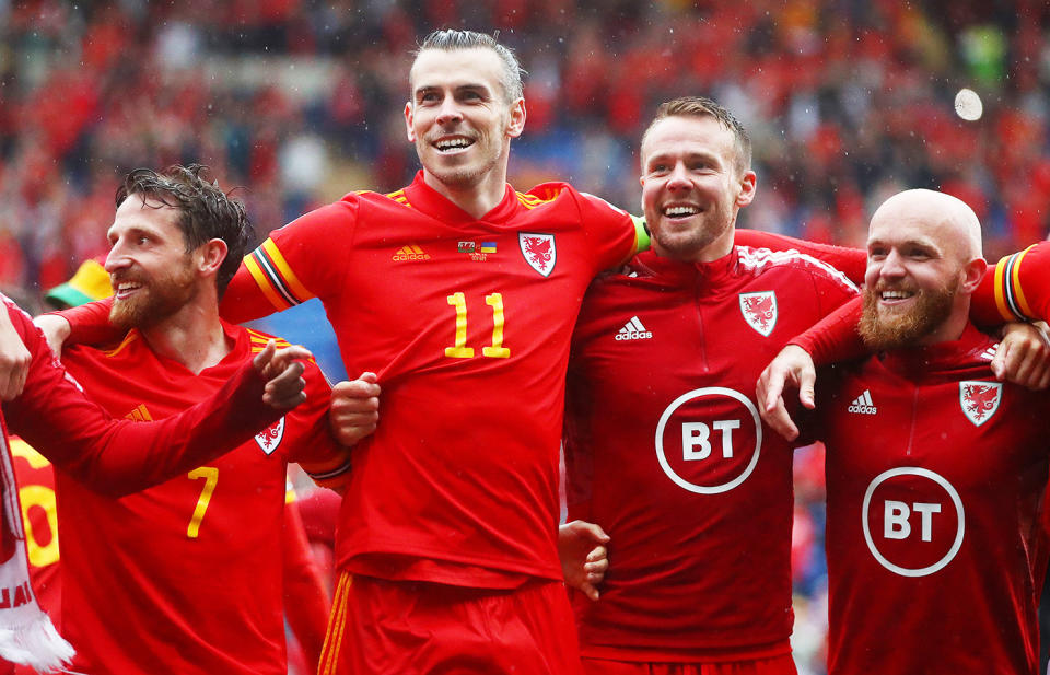 Wales players, pictured here celebrating after victory over Ukraine in their FIFA World Cup Qualifier.