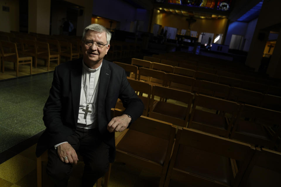 Bishop of Antwerp, Johan Bonny, poses for a portrait at a church in Lier, Belgium, Wednesday, May 24, 2023. Across Europe, the continent that nurtured Christianity for most of two millennia, many churches, convents, beguinages and chapels stand empty and increasingly derelict as faith and church attendance have shriveled over the past half century. Many have now been repurposed for other activities to preserve their historical and architectural relevance. (AP Photo/Virginia Mayo)
