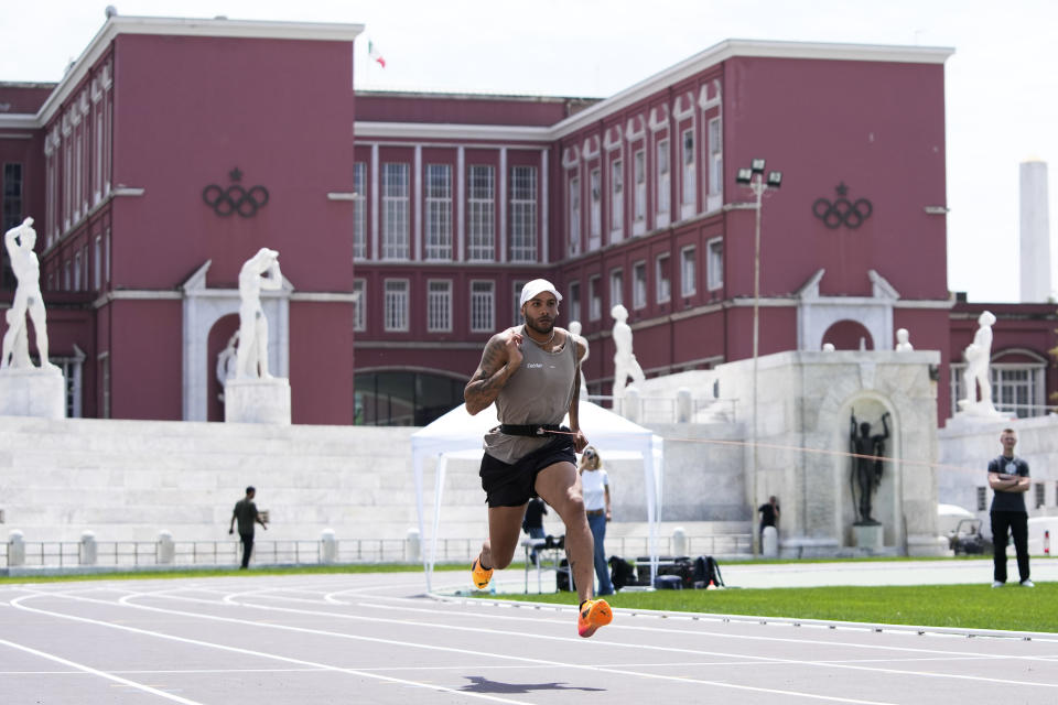 Defending Olympic 100 meters champion Marcell Jacobs runs during a training session in the historic Stadio dei Marmi ahead of an athletics meeting in Rome, Wednesday, May 15, 2024. (AP Photo/Alessandra Tarantino)