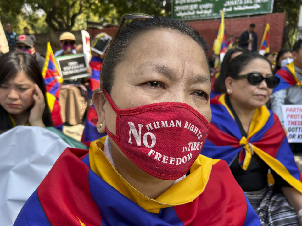 Exile Tibetans attend a rally to mark the anniversary of the 1959 Tibetan uprising in Lhasa, in New Delhi, India, Sunday, March 10, 2024. Hundreds of Tibetans in exile marched on the New Delhi streets on Sunday to commemorate the 65th Tibetan National Uprising Day against China to honor the Tibetan martyrs and express concern over the appalling situation in Tibet. (AP Photo/Shonal Ganguly)