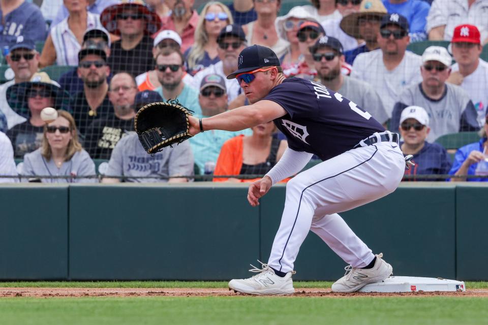 Detroit Tigers first baseman Spencer Torkelson (20) catches the ball against the New York Yankees during the first inning at Publix Field at Joker Marchant Stadium in Lakeland, Florida, on Friday, March 10, 2023.