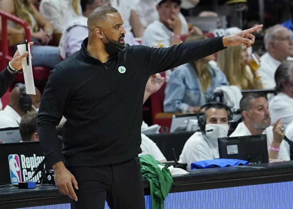 Boston Celtics head coach Ime Udoka gestures during the first half of Game 5 of the NBA basketball Eastern Conference finals playoff series against the Miami Heat, Wednesday, May 25, 2022, in Miami. (AP Photo/Lynne Sladky)