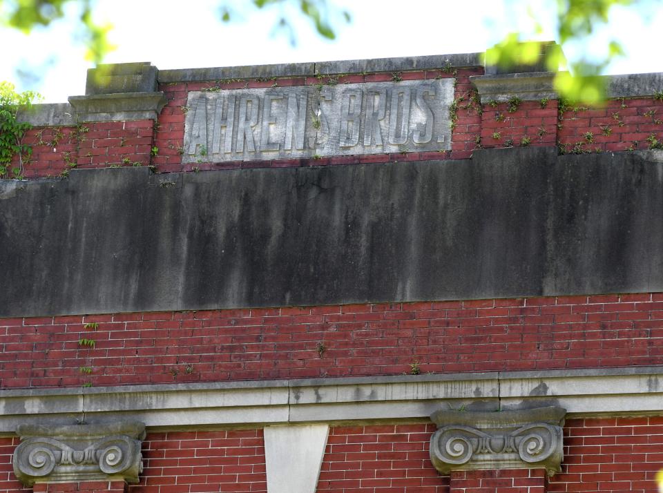 The top of the Ahrens Building features the "Ahren Bros" name at 112 Market Street.    [MATT BORN/STARNEWS]