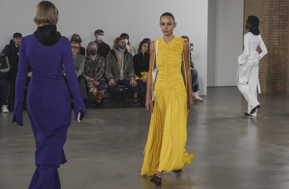 Fashion from Proenza Schouler collection is modeled during Fashion Week, Friday, Feb. 11, 2022 in New York. (AP Photo/Bebeto Matthews)