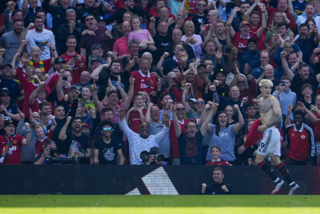 Manchester United's Alejandro Garnacho celebrates after scoring his side's second goal during the English Premier League soccer match between Manchester United and Wolverhampton at the Old Trafford stadium in Manchester, England, Saturday, May 13, 2023. (AP Photo/Jon Super)