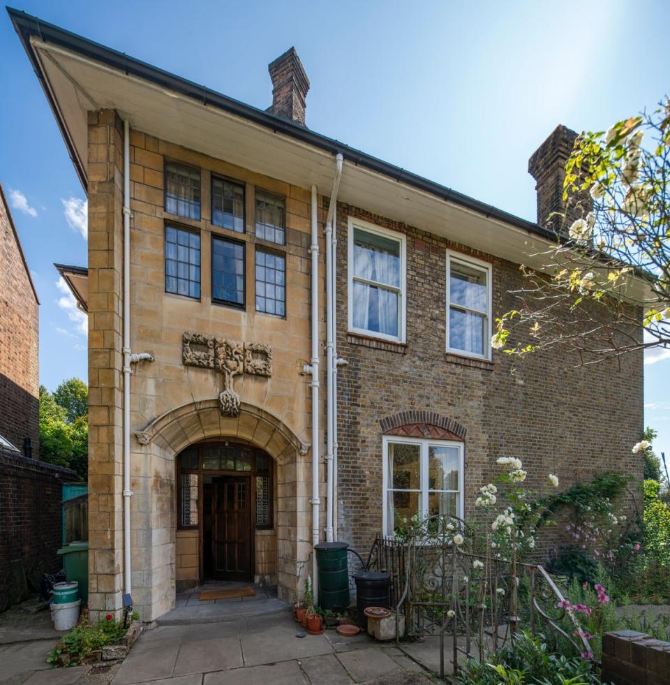 The house’s original Georgian architecture meets its Tudor-style extension (Aston Chase/Tony Murray Photography)