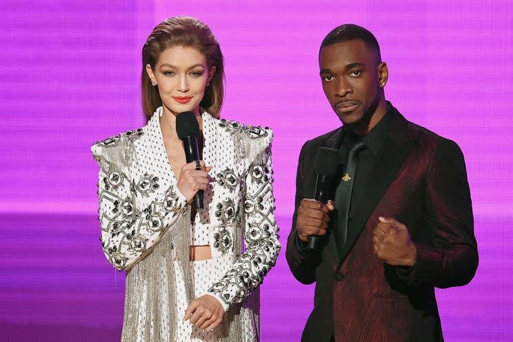 Co-hosts Gigi Hadid and Jay Pharoah speak onstage during the 2016 American Music Awards at Microsoft Theater on November 20, 2016 in Los Angeles, California. (Photo by Kevin Winter/Getty Images)