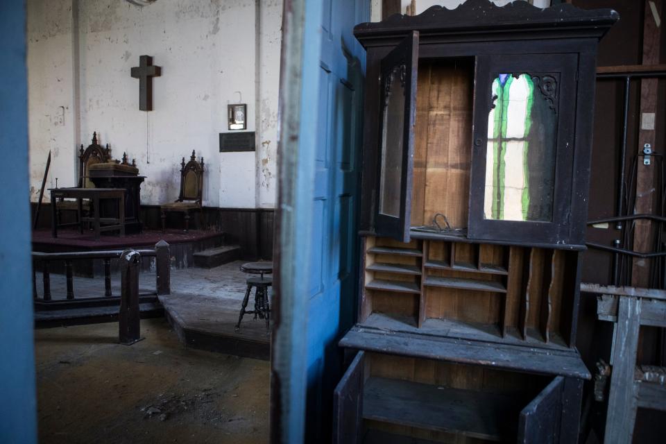  The altar at Zoar Methodist Episcopal Church in Odessa is seen from a side room, Del. Wednesday, Nov. 24, 2021.   