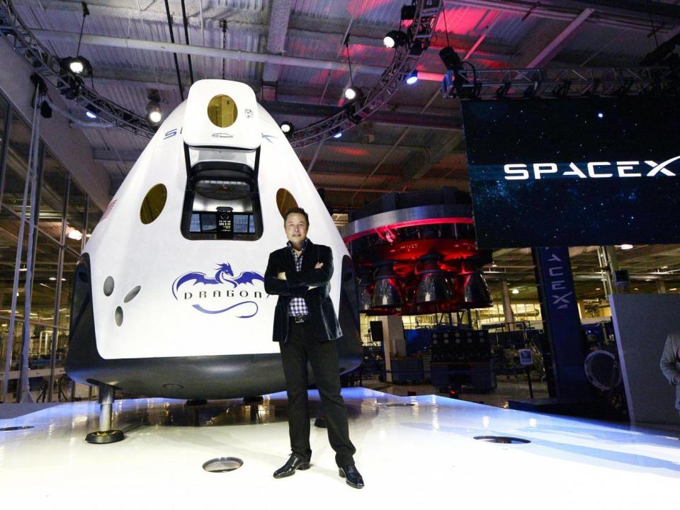 Elon Musk and Space X’s manned spacecraft the Dragon V2, 2014 (Getty)