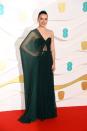 <p>Daisy Ridley turned heads in a strapless number with a sheer pleated sleeve by Oscar de la Renta. </p>