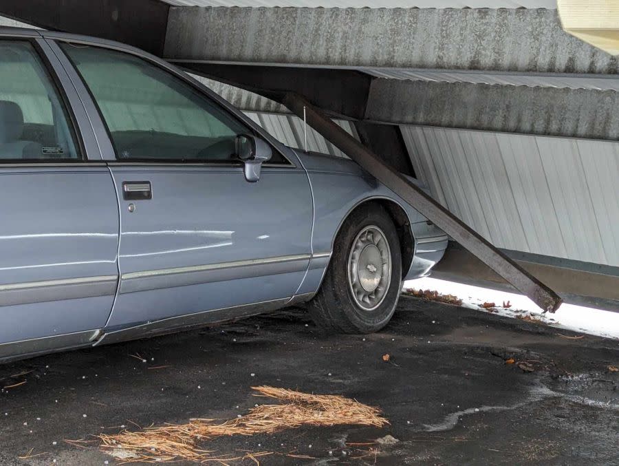 A photo from the woman who declined to be identified shows her car under the collapsed carport. (courtesy photo)