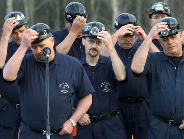 The Men of the Deeps perform during a candlelight ceremony to mark the 10th anniversary of the Westray mine disaster in 2002.