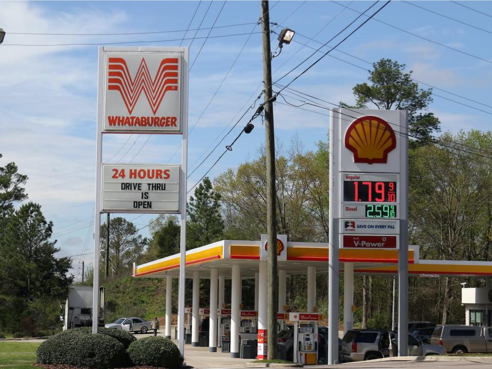  Whataburger and Shell gas station sign shows coronavirus impacts on Alabaster, Alabama on March 22, 2020.