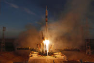 The Soyuz-FG rocket booster with Soyuz MS-11 space ship carrying a new crew to the International Space Station, ISS, blasts off at the Russian leased Baikonur cosmodrome, Kazakhstan, Monday, Dec. 3, 2018. The Russian rocket carries U.S. astronaut Anne McClain, Russian cosmonaut Оleg Kononenko‎ and CSA astronaut David Saint Jacques. (AP Photo/Dmitri Lovetsky)