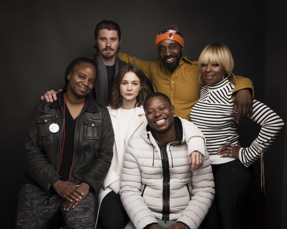 Director Dee Rees, from left, actors Garrett Hedlund, Rob Morgan, Mary J. Blige, Carrey Mulligan, center, and Jason Mitchell, bottom pose for a portrait to promote the film, "Mudbound", at the Music Lodge during the Sundance Film Festival on Saturday, Jan. 21, 2017, in Park City, Utah. (Photo by Taylor Jewell/Invision/AP)