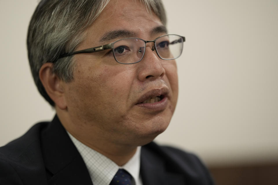 Junichi Matsumoto, an official of Tokyo Electric Power Company Holdings (TEPCO), speaks in an interview with The Associated Press at the TEPCO headquarters in Tokyo, Friday, July 28, 2023. A corporate officer in charge of treated water management for TEPCO, which operates the damaged Fukushima nuclear power plant, Matsumoto on Friday said says an upcoming release of the treated radioactive water into sea more than 12 years after the meltdown disaster marks “a milestone,” but is still an initial step of the daunting task of decades-long decommissioning process that still remain. (AP Photo/Hiro Komae)