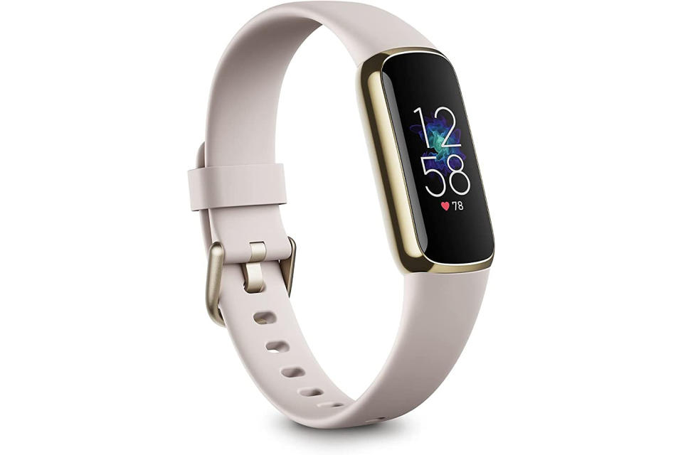 Fitbit Luxe Fitness and Wellness Tracker with Stress Management, Sleep Tracking and 24/7 Heart Rate, Lunar White/Soft Gold, One Size (S & L Bands Included) - Singapore Edition. (Photo: Amazon SG)