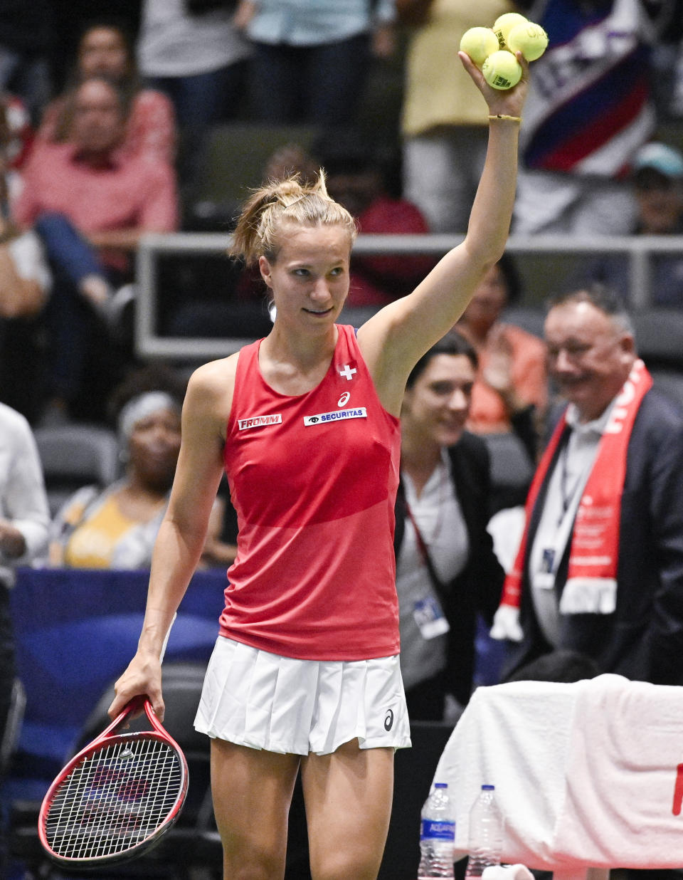 Switzerland's Viktorija Golubic waves to fans after her playoff-round Fed Cup tennis match win against Madison Keys of the United States, Saturday, April 20, 2019, in San Antonio. (AP Photo/Darren Abate)