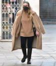 <p>Dakota Fanning rocks a neutral outfit while taking a stroll around Venice, Italy — where she is filming <em>Ripley</em> — on Jan. 18. </p>