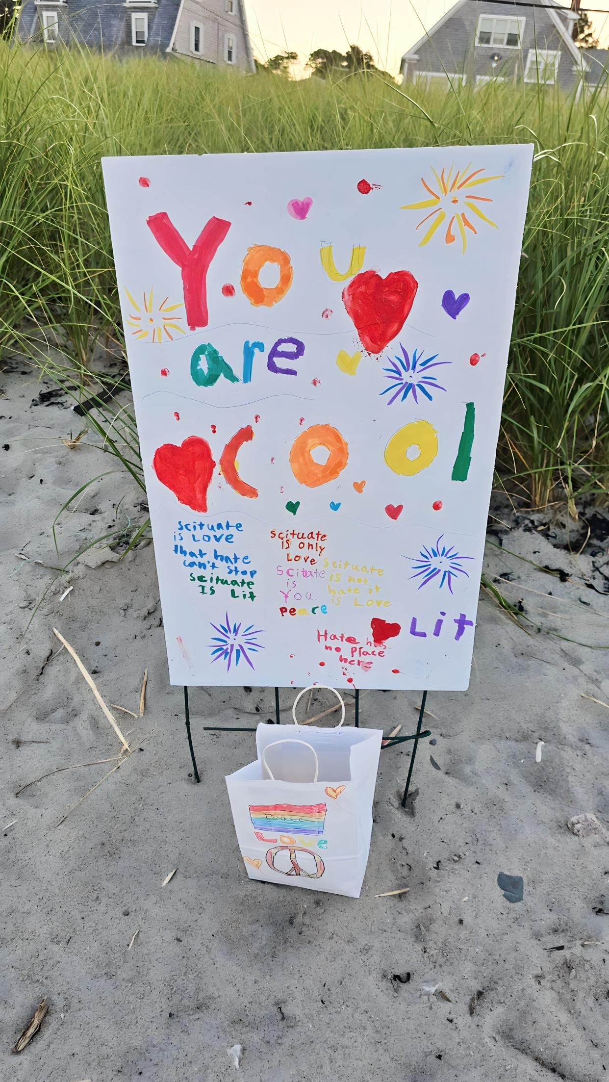 Scituate residents placed illuminated lanterns along the seashore in support of Scituate Public Schools Diversity, Equity and Inclusion Director jamele adams, who was the target of a hateful message in July.