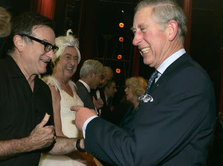 Britain's Prince Charles (R) meets US actor Robin Williams (L) backstage at the Wimbledon Theatre, in London November 12, 2008. REUTERS/Alastair Grant/Pool/Files
