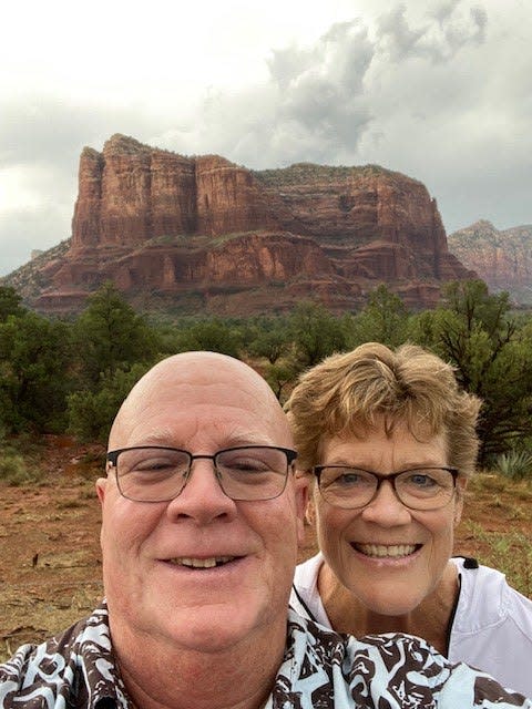 Arizona State assistant coach Mike Cavanaugh, left, and his wife, Laurie.