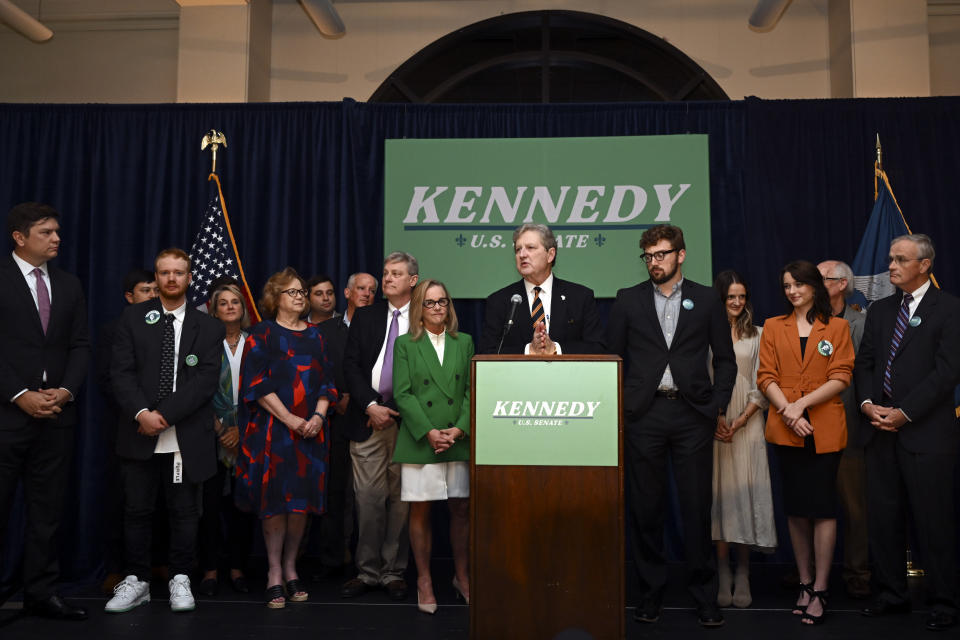 Sen. John Kennedy, joined by friends and family addresses supporters during his election night party, Tuesday, Nov. 8, 2022, at the Lod Cook Alumni Center on the campus of LSU in Baton Rouge, La. (Hilary Scheinuk/The Advocate via AP)