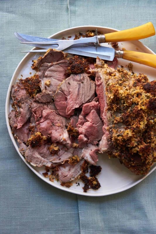 <p>Katie Workman</p><p>This is a showstopper. The meat is seasoned with garlic, orange zest and herbs and marinated overnight. The roast is then covered in a thick layer of mustardy Panko breadcrumbs speckled with fresh parsley which forms a fabulous crust.</p><p><strong>Get the recipe: <a href="https://themom100.com/recipe/slow-cooked-herbed-leg-lamb-fresh-herb-arugula-salad/" rel="nofollow noopener" target="_blank" data-ylk="slk:Herbed Boneless Leg of Lamb with Mustard Crust;elm:context_link;itc:0;sec:content-canvas" class="link ">Herbed Boneless Leg of Lamb with Mustard Crust</a></strong></p>