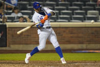 New York Mets' Javier Baez (23) hits a home run during the ninth inning of a baseball game against the St. Louis Cardinals Tuesday, Sept. 14, 2021, in New York. (AP Photo/Frank Franklin II)