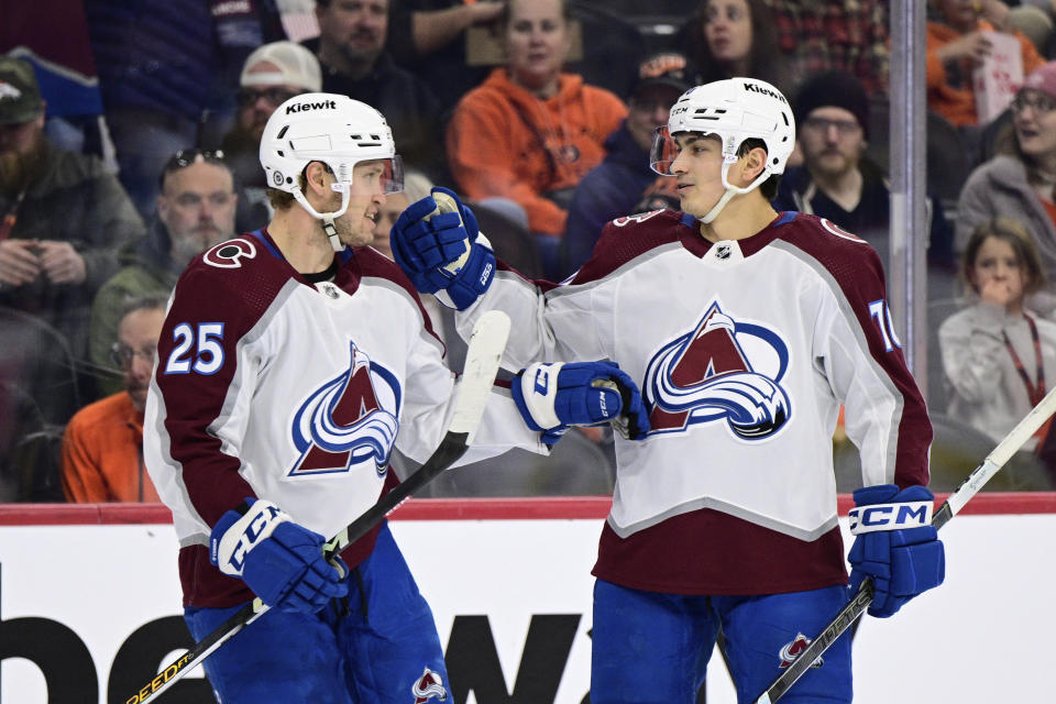 Colorado Avalanche's Logan O'Connor (25) celebrates with Sam Malinski after scoring a goal during the first period of an NHL hockey game against the Philadelphia Flyers, Saturday, Jan. 20, 2024, in Philadelphia. (AP Photo/Derik Hamilton)