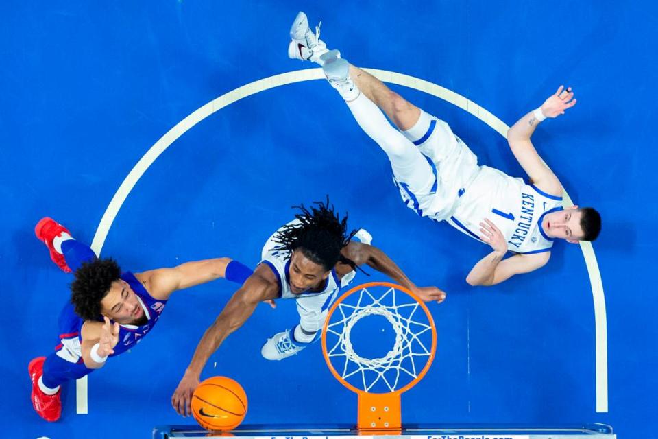 Kentucky Wildcats guard Cason Wallace (22) blocks a shot by Kansas Jayhawks forward Jalen Wilson (10) during the game at Rupp Arena in Lexington, Ky., Saturday, January 28, 2023. The reigning national champion Jayhawks survived a raucous Rupp Arena crowd what could have been coach Bill Self’s first four-game skid in 20 seasons as Jayhawks’ head coach. But Kansas No. 9 won, 77-68.