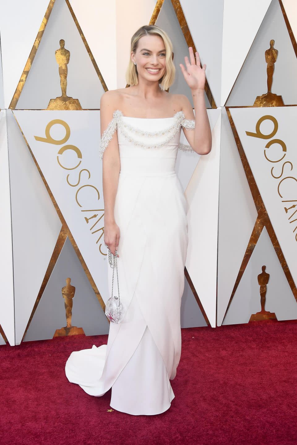 She waved to the crowd wearing a breathtaking white column Chanel dress. Photo: Getty Images