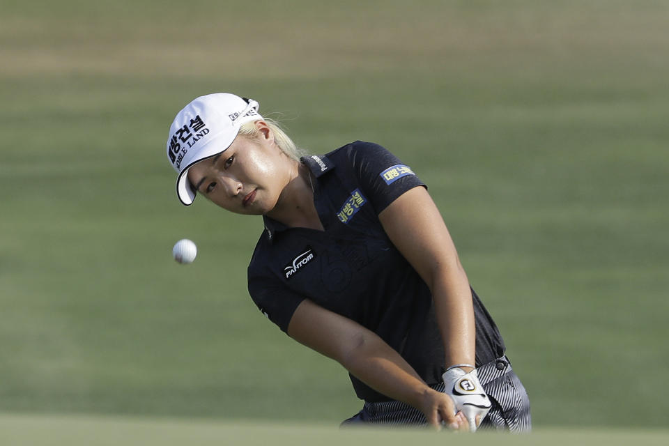 FILE - In this June 2, 2019, file photo, Jeongeun Lee6, of South Korea, chips to the 16th green during the final round of the U.S. Women's Open golf tournament, in Charleston, S.C. Hazeltine has a recent history of shockers, whether it was Rich Beem or Y.E. Yang winning the PGA Championship or the Americans winning the Ryder Cup. Now it hosts the Women's PGA Championship, a major that is rising to the top with the courses it plays. Women's Open champion Jeongeun Lee6 will be part of a strong field that features 99 or the 100 on the LPGA money list. (AP Photo/Steve Helber, File)