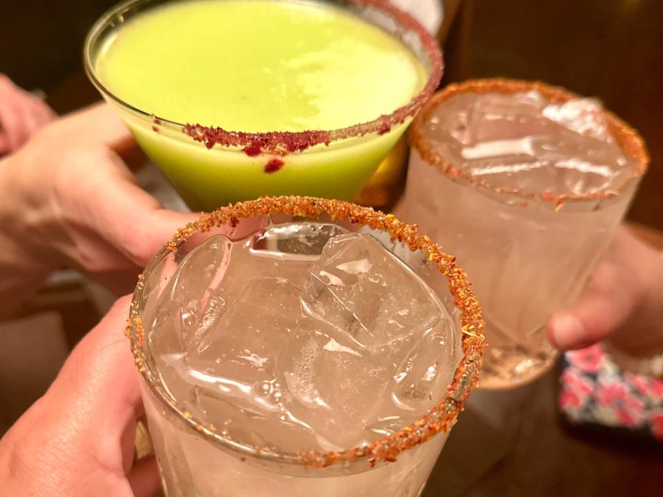 different margaritas and cocktails from cava del tequila in epcot cheersing