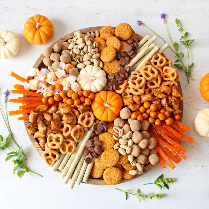 <p>Glorious Treats</p><p>Here's some fall inspiration for you to create a snack and treat board with fall in mind! Your family and friends will love the effort you put into sharing this. </p><p><strong>Get the recipe: <a href="https://www.glorioustreats.com/fall-dessert-charcuterie-board/" rel="nofollow noopener" target="_blank" data-ylk="slk:Fall Charcuterie Board;elm:context_link;itc:0;sec:content-canvas" class="link ">Fall Charcuterie Board</a></strong></p>