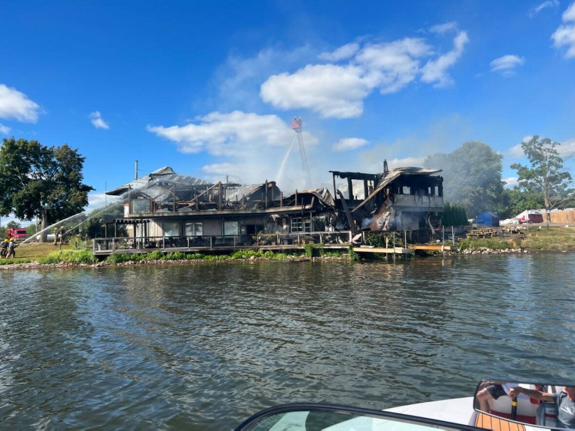 A massive fire tore down a large portion of the Old Marina Restaurant in Puslinch. (Puslinch Fire and Rescue Service - image credit)