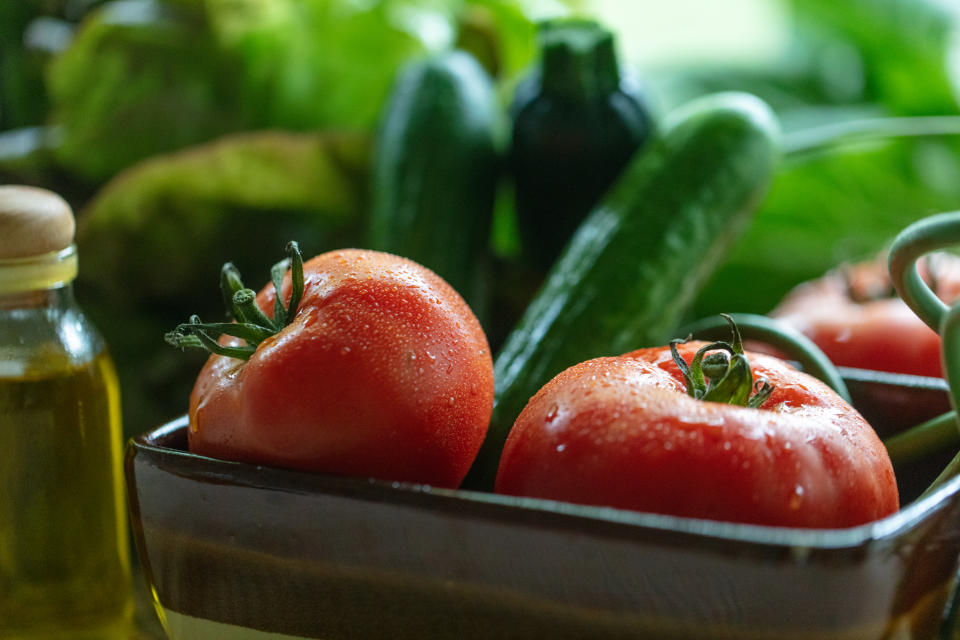 cucumbers and tomatoes close-up image