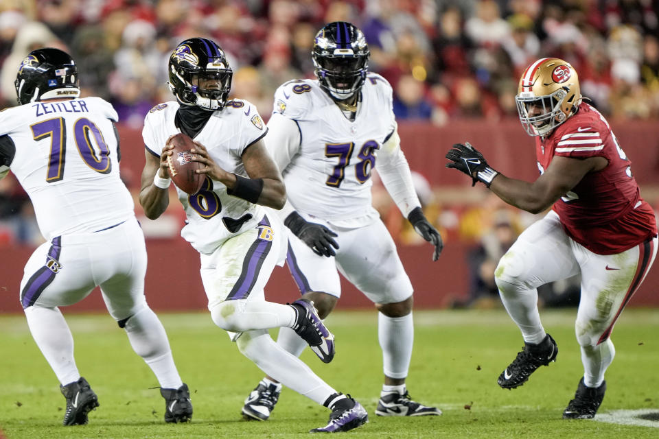 SANTA CLARA, CALIFORNIA – DECEMBER 25: Lamar Jackson #8 of the <a class="link " href="https://sports.yahoo.com/nfl/teams/baltimore/" data-i13n="sec:content-canvas;subsec:anchor_text;elm:context_link" data-ylk="slk:Baltimore Ravens;sec:content-canvas;subsec:anchor_text;elm:context_link;itc:0">Baltimore Ravens</a> attempts a pass during the third quarter against the San Francisco 49ers at Levi’s Stadium on December 25, 2023 in Santa Clara, California. (Photo by Thearon W. Henderson/Getty Images)