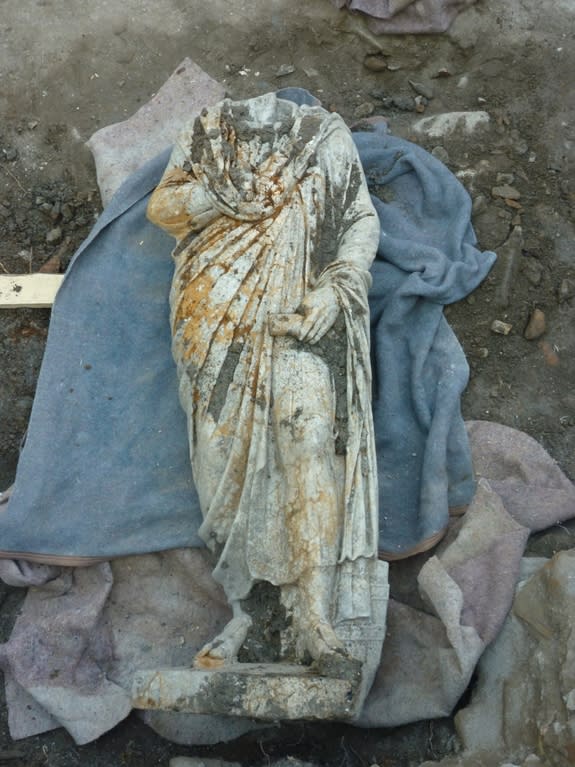 Statue A is dressed in a civilian costume of a cloak and tunic. (Photo courtesy of R.R.R. Smith)