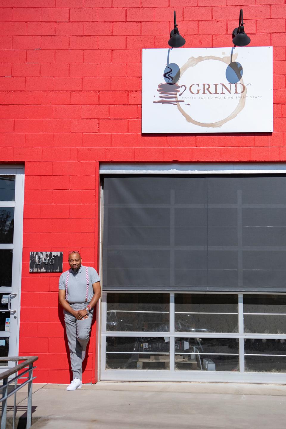 J. Hackett stands outside Grind Coffee Co. in 2020.