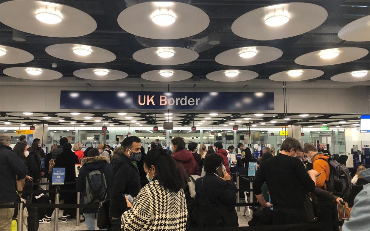  People queue at terminal 5 of Heathrow Airport - Pia Josephson/Reuters