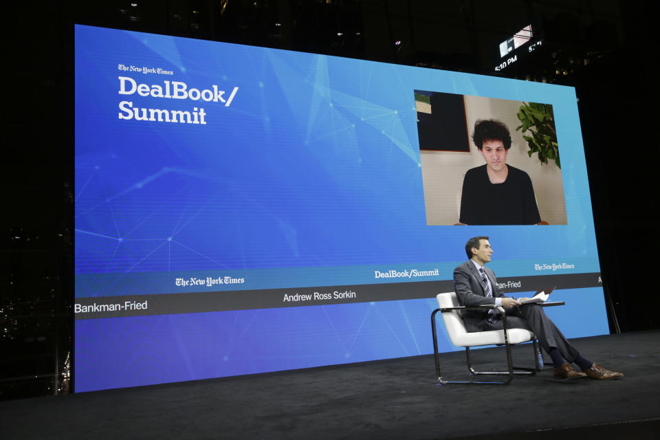 NEW YORK, NEW YORK - NOVEMBER 30: Andrew Ross Sorkin and Sam Bankman-Fried on stage at the 2022 New York Times DealBook on November 30, 2022 in New York City. (Photo by Thos Robinson/Getty Images for The New York Times)