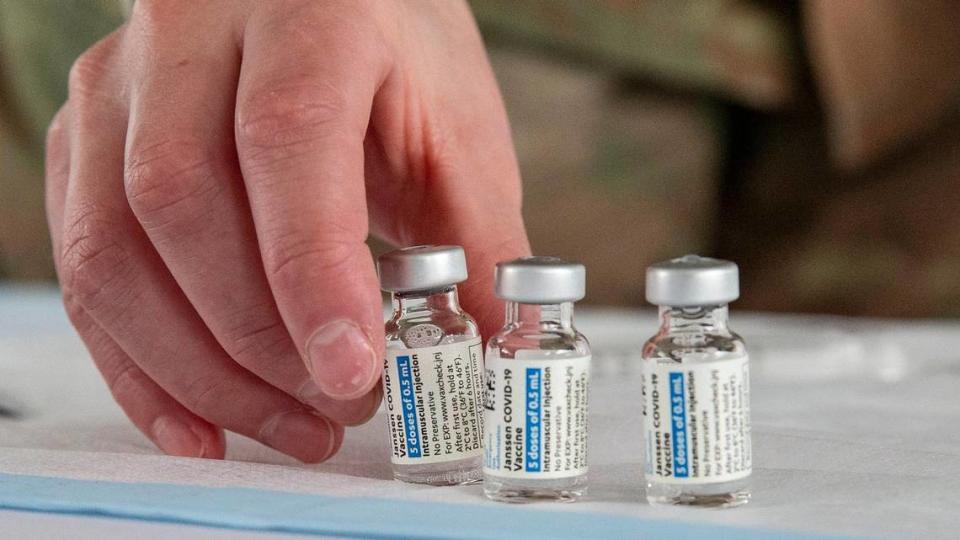 Vials of the Johnson & Johnson Janssen COVID-19 vaccine are prepared to be used during opening day of the FEMA vaccination site on Miami Dade College’s North Campus on Wednesday, March 3, 2021.