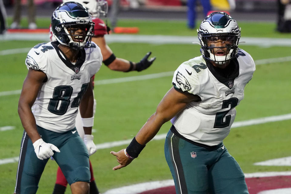 Philadelphia Eagles quarterback Jalen Hurts (2) celebrates his touchdown against the Arizona Cardinals during the second half of an NFL football game, Sunday, Dec. 20, 2020, in Glendale, Ariz. (AP Photo/Rick Scuteri)