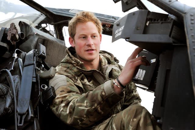 <p>John Stillwell - WPA Pool/Getty</p> Prince Harry in Afghanistan in 2012.